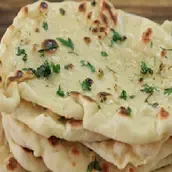 Ananda Bhavan | Garlic naan | Bahrain | WhatToEat Food | Restaurant | Cafe | 